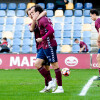 Charly celebra uno de sus goles en el partido de liga entre Pontevedra y Coruxo en Pasarón