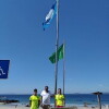 Izado de la bandera azul en la playa de Bascuas
