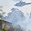 Tareas de extinción del incendio forestal en Cerponzóns