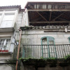 Edificio de la calle Princesa en el que cayó parte de la fachada