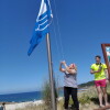 Izado de la bandera azul en la playa de Pragueira