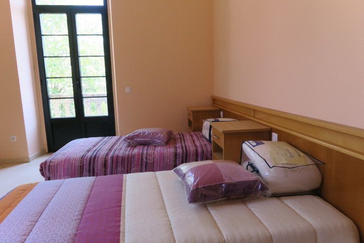 Habitación con camas en la Casa da Quintán