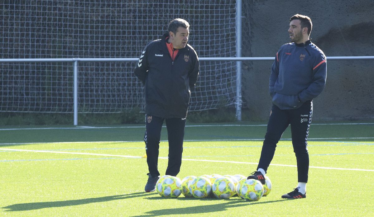 Carlos Pouso y Jesús Ramos en el entrenamiento de este lunes en Campañó