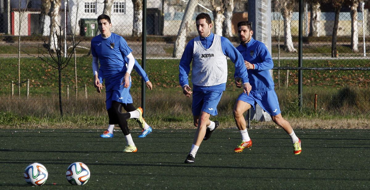 Anxo, Centrón y Jorge durante un entrenamiento del Pontevedra en A Xunqueira