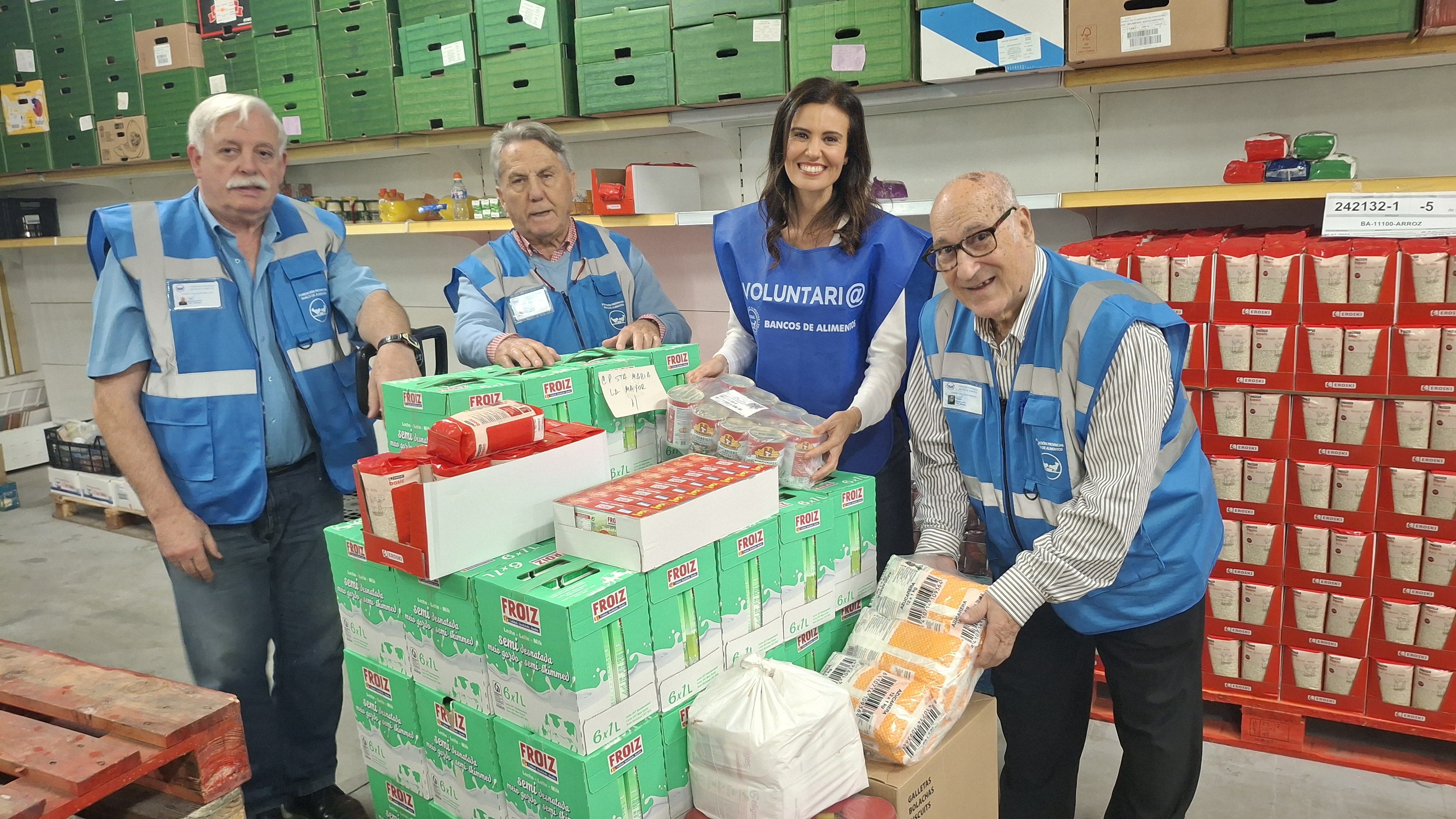 José Prieto, José Luis Doval, Diana Nogueira e Polo Quinteiro no almacén de Pontevedra do Banco de Alimentos