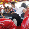 Día del niño en las atracciones de la Fiesta de la Peregrina