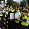 Protesta de los trabajadores de ENCE en el pregón de las Festas da Peregrina