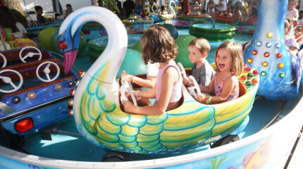 Día del niño en las atracciones de las fiestas de la Peregrina